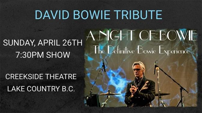 performer on stage with cosmic lightshow in the background