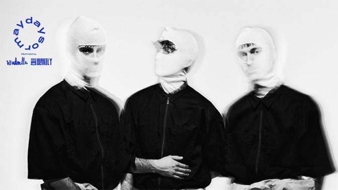 Three men in white balaclavas and black zip up shirts
