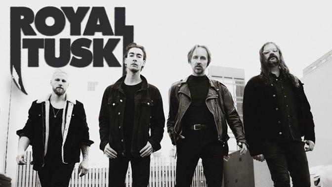 Black and white street scene portrait of the 4 members of the musical band Royal Tusk