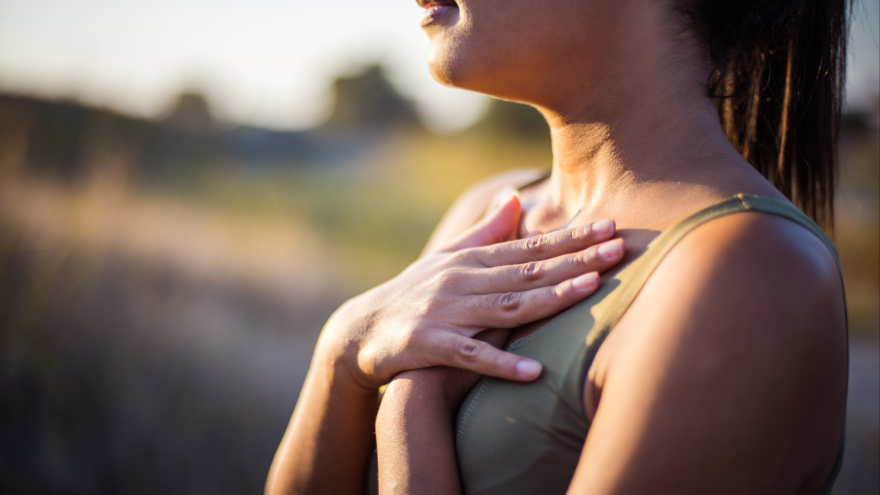 women with hands crossed over chest