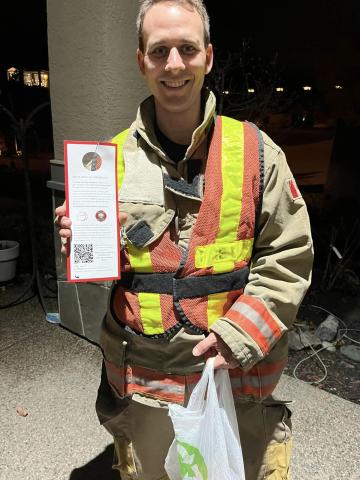 Firefighter collecting donations for Food Bank
