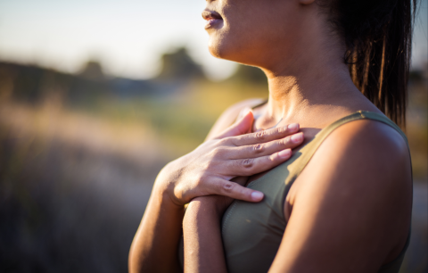 women with hands crossed over chest