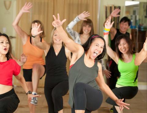 Women Dancing Looking Happy