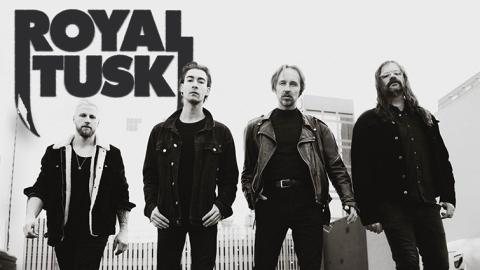 Black and white street scene portrait of the 4 members of the musical band Royal Tusk