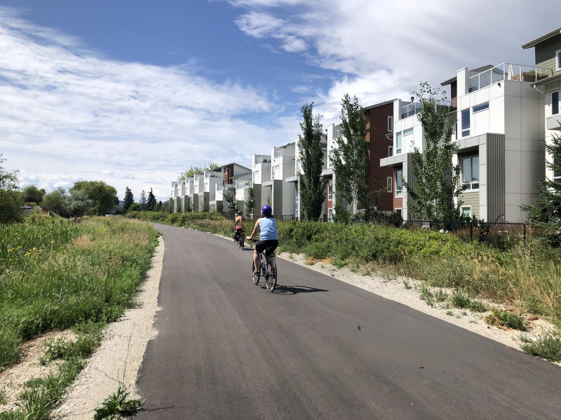 cyclists use active transportation corridor